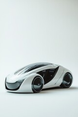 A white car with a black wheel. The car is parked on a white background. The car is a futuristic looking vehicle