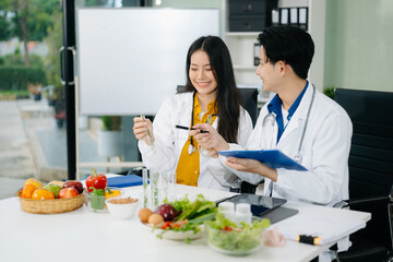 Nutritionists consulting on healthy food choices, meal planning, and wellness concepts