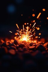 Close-up of fiery sparks against dark background, hot sparks, dark background