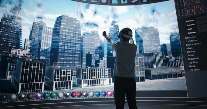 Young Male Architect Explores the Possibilities of Parametric Design, Wearing a Virtual Reality Headset and Interacting with a Digital City. LED Wall Shows the Creative Evolving Design Process