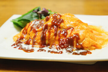 Delicious-looking omelette rice, freshly prepared with ketchup