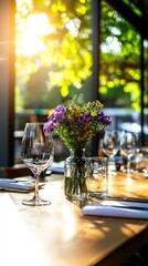 Elegant Table Setting with Fresh Flowers and Glimmering Glassware Illuminated by Soft Sunlight
