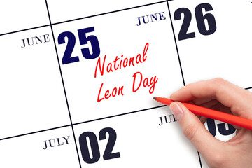 June 25. Hand writing text National Leon Day on calendar date. Save the date.