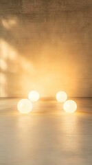 A serene scene featuring glowing orbs on a smooth surface, casting warm light against a soft, textured backdrop.
