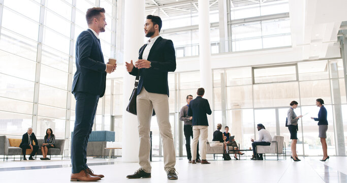 Business, men and networking event in office for b2b collaboration, financial expo and startup ideas. Seminar review, people and low angle at global convention for career development and workshop