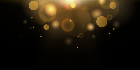Abstract bokeh gold glitter on isolated black background. abstract shiny gold glitter sparkles bokeh