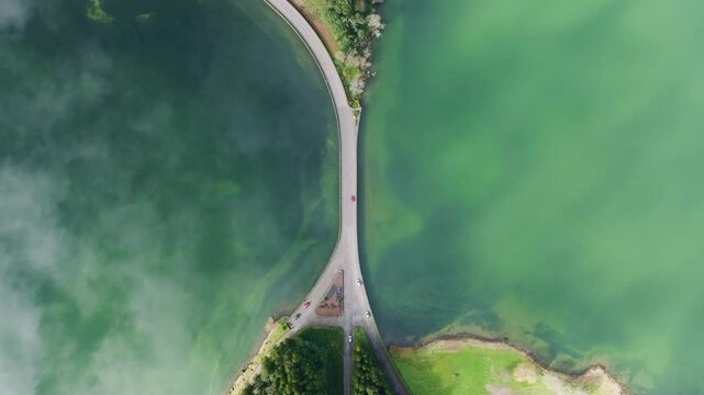 Top down aerial view of bridge over volcanic crater lakes, Sete Cidades, Azores
