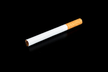 Cigarette butts isolated on black background