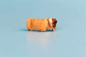 Cigarette butts isolated on blue background