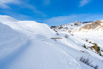Winter landscape on the First mountain in Swiss Alps in Grindelwald ski resort, Switzerland