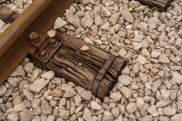 old wooden textured railroad sleepers in rubble