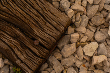 old wooden textured railroad sleepers in rubble