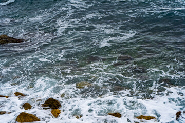 sea ​​foam in blue water - background, photo wallpaper