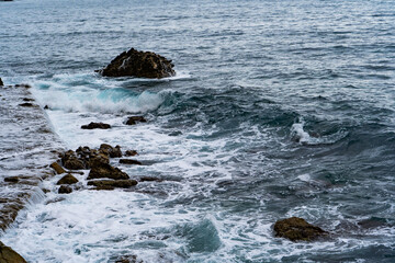 sea ​​foam in blue water - background, photo wallpaper