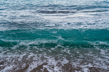 sea ​​foam in blue water - background, photo wallpaper