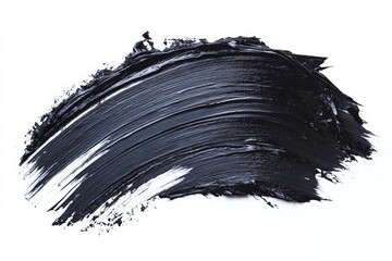 Black paint stroke on a white background showcasing texture and artistic potential for various projects