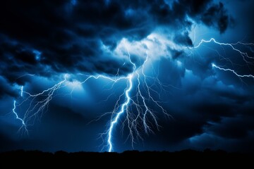 Bright lightning illuminates dark storm clouds at night, creating a dramatic and powerful scene