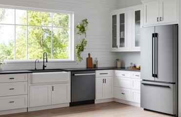 A kitchen with a stainless steel refrigerator and a black dishwasher