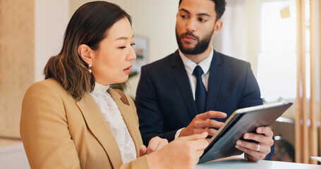 Hotel, tablet and woman at check in with man, advice or reception service for hospitality. Digital...