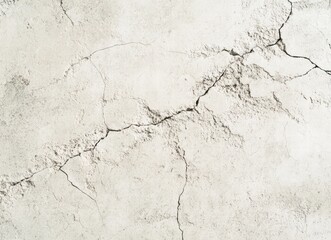 Obraz premium A cracked and broken concrete wall with a white background
