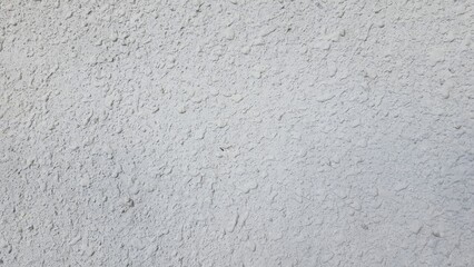 Rough white cement wall texture, rough surface, colored texture on cement background, antique wall texture through time.