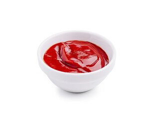 Fresh red ketchup in a white bowl ready for serving at a casual meal setting