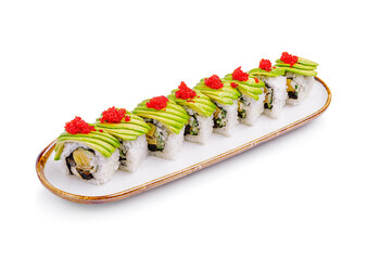 Freshly prepared sushi rolls with avocado and fish roe arranged neatly on a long platter
