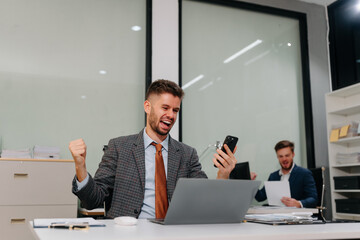 Smiling confident mature businessman creative are excited business success.