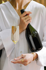 Celebrating with champagne at a stylish gathering in a modern setting