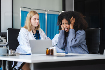concerned woman patient, patient talks with healthcare professional.