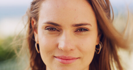 Portrait, wellness and windy with woman outdoor in nature for holiday, travel or vacation in summer. Hair, relaxing and sunshine with satisfied tourist person in Australia for weekend getaway