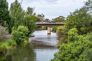 The concrete bridge on Princes Highway stretches across the Mitchell River in Bairnsdale, Victoria....