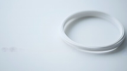 Fototapeta premium Close up of charging cable being stretched, illustrating the tension and strain of modern connectivity and the reliance on technology in daily life