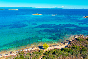 Obraz premium Panoramic view of seascape with beautiful bay on a sunny day. View from above. Vourvourou, Greece, Europe