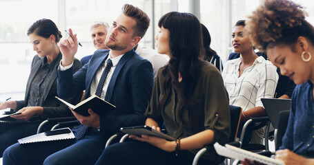 Question, group and business people at seminar with notes for corporate training, development or PR...