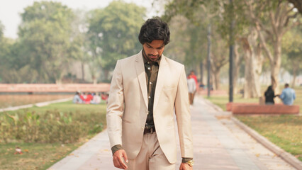 Sad Indian Businessman Walking