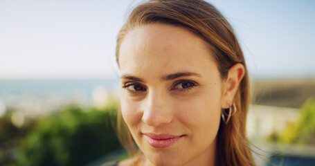 Outdoor, portrait and woman with smile, vacation and summer holiday with adventure. Happy person, ocean and traveller with weekend break, mindfulness or explore with positive energy and nature
