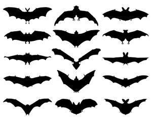 Big set of black silhouettes of bats on a white background	