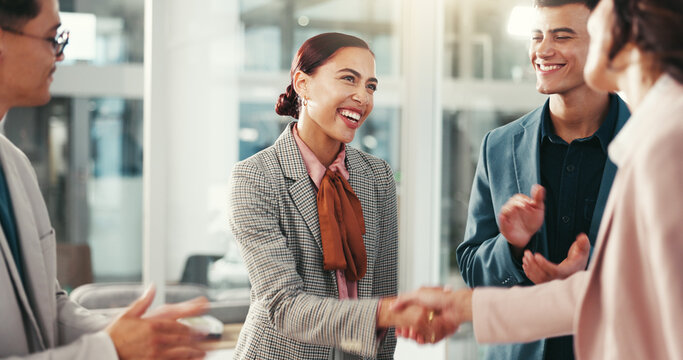 Handshake, applause and happy business people in office for teamwork, collaboration and partnership. Corporate, professional and men and women shaking hands for promotion, agreement and onboarding