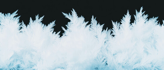 Obraz premium Frozen fractal texture with icy colors on a dark background creating a cold atmosphere