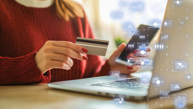 Artificial intelligence and fintech innovation, woman comfortably shopping online with a digital credit card