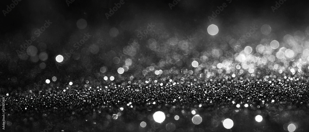 Poster glitter overlay texture with luminous light particles on dark background for subtle effects