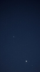 Moon with starry Milky Way background.