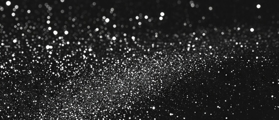 Obraz premium Sparkling glitter texture creating a festive atmosphere on black background