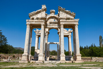Tetrapylon ancient monument ruins in Aphrodisias. Archaeology landmark in Turkey