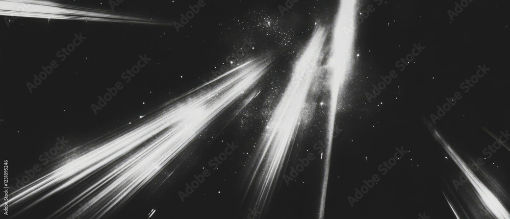Poster light trails and streaks create dynamic textures on a dark background for creative messaging