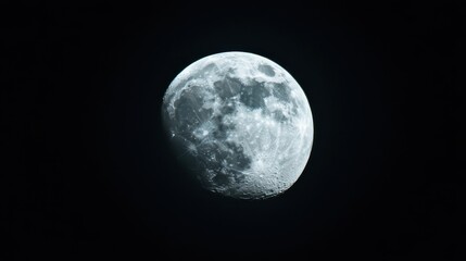 Glowing moon illuminates the night sky with serene brilliance