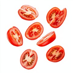 Slices of tomatoes flying isolated on white background.
