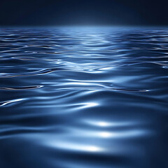 Dark blue abstract background. Reflection of light on a smooth surface of water with small waves.