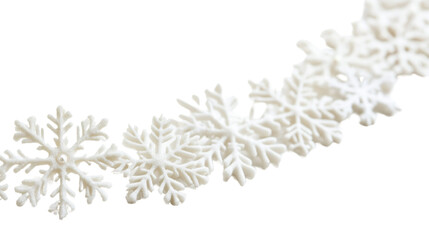A close-up image showcases a delicate white snowflake garland, ideal for winter or Christmas decorations.